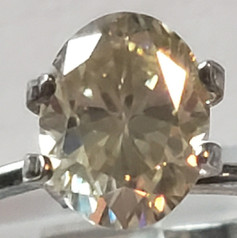 1.5ctw light yellow oval moissanite